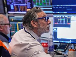 trader john romolo right works on the floor of the new york stock exchange tuesday feb 3 2026