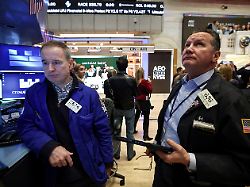 traders work on the floor at the new york stock exchange nyse in new york city u s february 9 2026