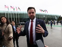 u s vice president jd vance speaks to the media before he boards air force two to depart for washington in baku azerbaijan wednesday feb 11 2026