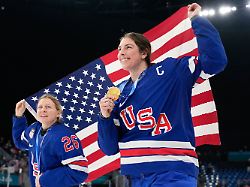 united states kendall coyne left and united states hilary knight celebrate after victory ceremony for women s ice hockey at the 2026 winter olympics in milan italy thursday feb 19 2026
