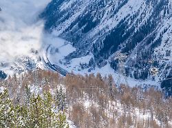 view of snow covered aosta valley from pavillon du mont frety in winter courmayeur aosta valley italian alps italy