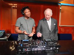 16 03 2026 manchester united kingdom king charles iii talks to christian st louis during a visit to aviva studios in manchester united kingdom