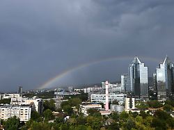 250818 almaty aug 18 2025 xinhua photo taken on aug 18 2025 shows a double rainbow in the sky over almaty kazakhstan