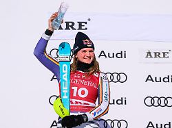 260315 emma aicher of germany celebrates on the podium after the the womens slalom during the fis alpine skiing world cup on march 15 2026 in are