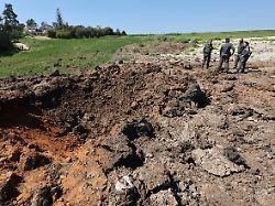 260317 beit shemesh march 17 2026 xinhua this photo taken on march 17 2026 shows an impact site of an iranian missile attack in beit shemesh israel