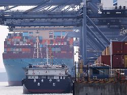 a cargo ship with containers docks at a terminal of the yantian port in shenzhen guangdong province china october 30 2025
