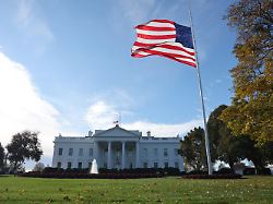 a large american flag flies on the north lawn of the white house in washington d c u s november 11 2025