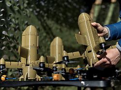 a person holds a sting interceptor drone by the ukrainian company wild hornets at an undisclosed location in ukraine march 16 2026