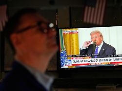 a television carries a speech by president donald trump on the floor at the new york stock exchange in new york monday march 2 2026