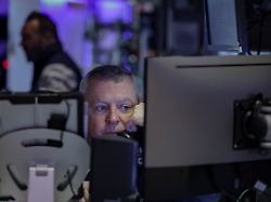 a trader works on the floor at the new york stock exchange nyse in new york city u s march 24 2026 1