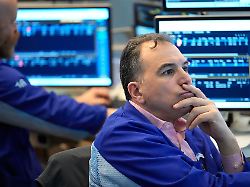 christopher lagana works on the floor at the new york stock exchange in new york thursday march 5 2026