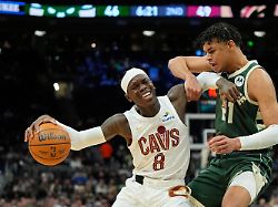 cleveland cavaliers dennis schroeder 8 drives to the basket against milwaukee bucks ousmane dieng during the first half of an nba basketball game wednesday feb 25 2026 in milwaukee