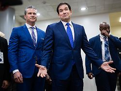 defense secretary pete hegseth looks on and secretary of state marco rubio reacts as they wait to speak with reporters after briefing senators on capitol hill jan 7 2026