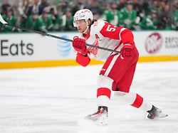 detroit red wings defenseman moritz seider watches his shot against the dallas stars during the second period of an nhl hockey game saturday march 14 2026 in dallas
