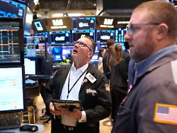ed curran and others work on the floor at the new york stock exchange in new york monday march 2 2026