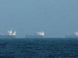 file photo tankers are seen off the coast of fujairah as iran vows to fire on ships transiting the strait of hormuz amid the u s israel conflict with iran in fujairah united arab emirates march 3 2026