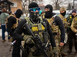 federal agents stand guard wednesday jan 21 2026 in minneapolis