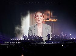 former eurovision song contest winner celine dion speak in a pre recorded video message during the first semi final of the 69th eurovision song contest in basel switzerland tuesday may 13 2025