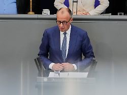 german chancellor friedrich merz delivers a statement during a session of the german parliament in berlin germany wednesday march 18 2026