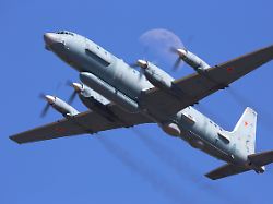 il 20m reconnaissance aircraft of the russian air force in flight in front of the moon zhukovsky russia