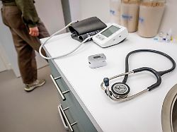 illustrative a general practitioner examines a patient during a visit to the irobin utrecht gp practice 1