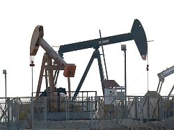 in bahrain specifically in manama on the desert outskirts there are oil refineries pictured archive photo outside manama in the desert area oil wells