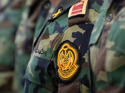 iranian army ground force military personnel participate in a friday prayers ceremony at the university of tehran in tehran iran on april 11 2025