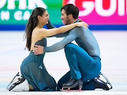 laurence fournier beaudry and guillaume cizeron from france hug after competing during the ice dance free dance at the figure skating world championships in prague czech republic saturday march 28 2026