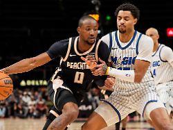 mar 16 2026 atlanta georgia usa atlanta hawks forward jonathan kuminga 0 dribbles against orlando magic guard jett howard 13 during the second half at state farm arena
