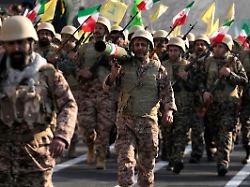 members of the iranian basij paramilitary force march during the force parade in tehran iran friday jan 10 2025