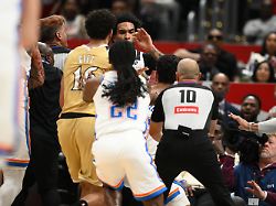 members of the oklahoma city thunder and the washington wizards scuffle during the first half of an nba basketball game saturday march 21 2026 in washington 1