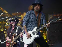 motorhead bassist lemmy kilmister left and lead guitarist phil campbell perform on the pyramid stage during glastonbury music festival on friday june 26 2015 at worthy farm glastonbury england