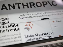 pages from the anthropic website and the company s logos are displayed on a computer screen in new york on thursday feb 26 2026