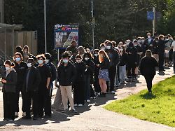 people queue to receive vaccinations at the sports centre on the university of kent campus following an outbreak of meningitis cases in kent in canterbury britain march 18 2026 reuters chris j