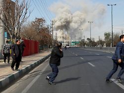 people run as smoke rises following an explosion amid the u s israeli conflict with iran in tehran iran march 5 2026