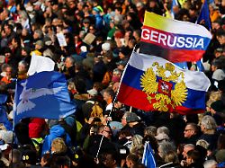 people take part in a pro russian anti war demonstration during the munich security conference msc in munich germany february 18 2023