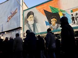 people walk near a mural featuring an image of iran s supreme leader ayatollah ali khamenei as people gather after khamenei was killed in israeli and u s strikes on saturday in tehran iran march 1 2026