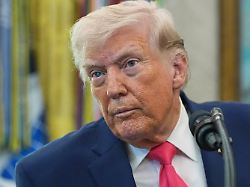 president donald trump listens to a reporter during the swearing in for homeland security secretary markwayne mullin in the oval office of the white house tuesday march 24 2026 in washington