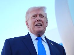 president donald trump speaks with the media before boarding air force one monday march 23 2026 at palm beach international airport in west palm beach fla