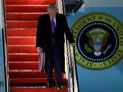 president donald trump walks down the stairs of air force one upon his arrival at joint base andrews md sunday march 29 2026 after visiting his mar a lago estate in palm beach fla ap photo luis m