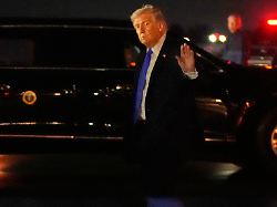 president donald trump waves after arriving on air force one friday march 13 2026 at palm beach international airport in west palm beach fla