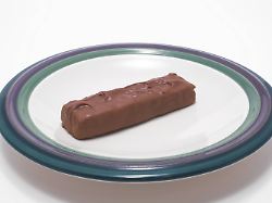 record date not stated a delicious chocolate candy bar on a plate 1