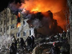 rescuers work at the site of the apartment building hit by a russian missile strike amid russia s attack on ukraine in kharkiv ukraine march 7 2026