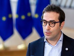 spain s economy minister carlos cuerpo caballero speaks with the media as he arrives for a meeting of eurozone finance ministers at the european council building in brussels monday march 9 2026
