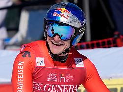 switzerland s marco odermatt reacts at the finish area of an alpine ski men s world cup downhill race in courchevel france friday march 13 2026