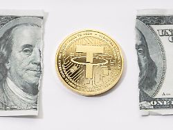 tether usdt coin and ripped dollar bill