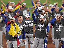 the venezuela team celebrates after defeating the united states in the championship game of the world baseball classic tuesday march 17 2026 in miami
