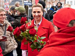 the leader of the social democrats mette frederiksen meets voters and signs an election poster at nytorv in aalborg on election day tuesday march 24 2026 1