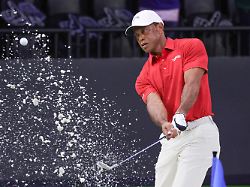 tiger woods hits a practice shot from a bunker before the tgl sofi cup finals in palm beach gardens fla tuesday march 24 2026 1