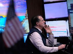 traders work on the floor at the new york stock exchange in new york tuesday march 10 2026 1